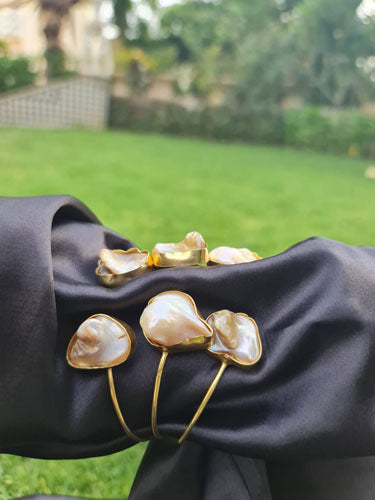 Golden Elegance Handcuff Bracelet