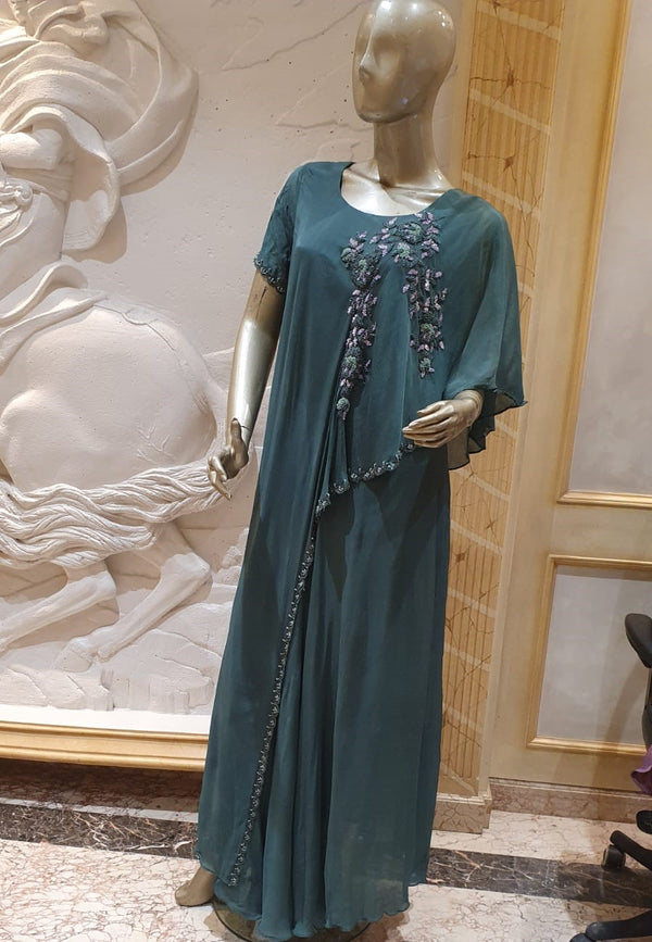 Green gown with short sleeve at one side