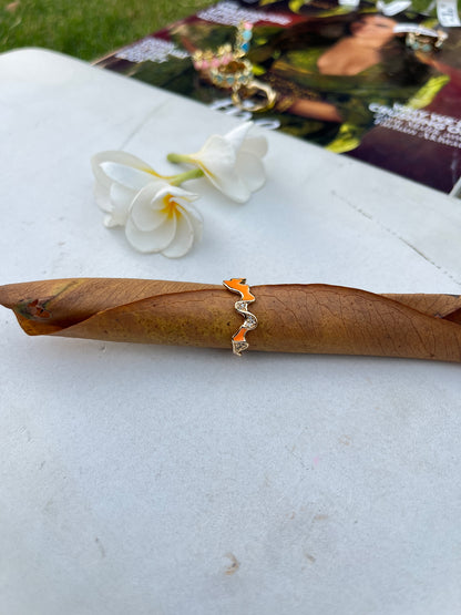 Ring with Orange Enamel Detail