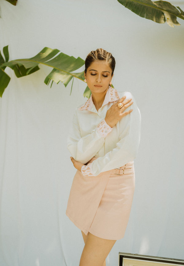 PINK CUFFS ON WHITE SHIRT