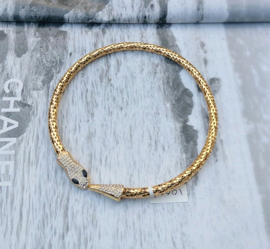 The Diamond-Eyed Coiled Gold Piece