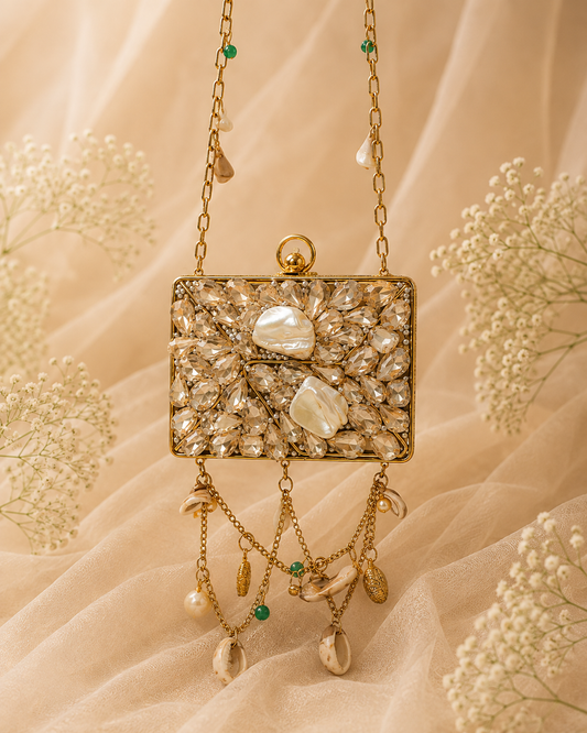 Nooré Shell Clutch [mini]